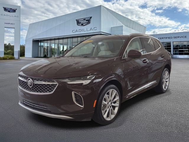 2023 Buick Envision Avenir in Rich Garnet Metallic — front three-quarter view