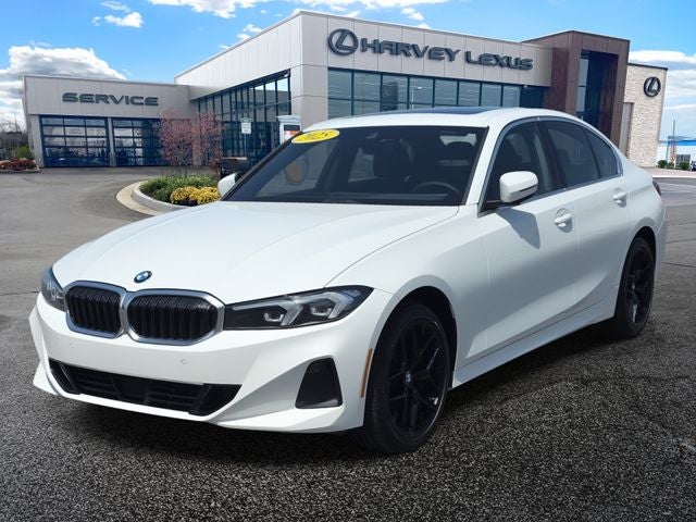 2025 BMW 3 Series 330i xDrive in Alpine White — front three-quarter view